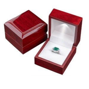 red wooden ring box